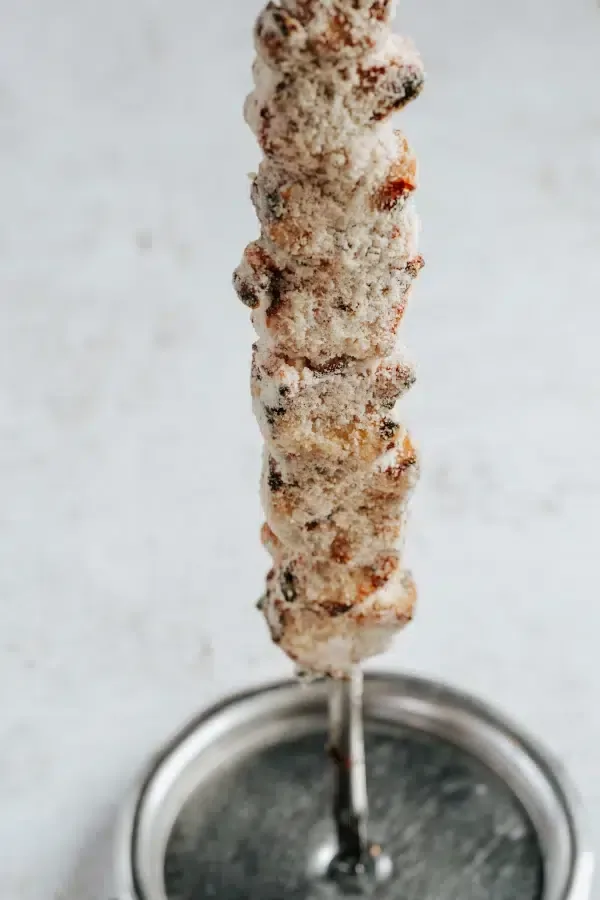 Lomo de cerdo con parmesano · Churrasquería Rodeo Grill